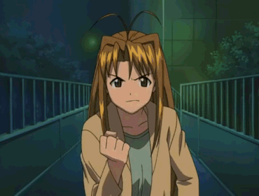 A Girl With Long Brown Hair Is Making A Funny Face With Her Mouth Open GIF