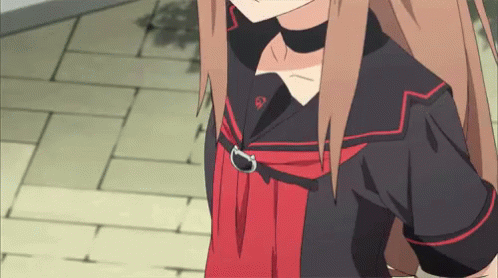 A Girl With Long Brown Hair Is Wearing A Black Shirt With Red Stripes GIF
