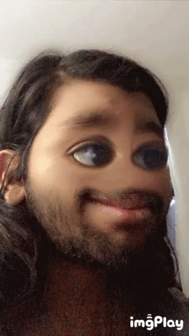 A Girl With Long Hair And A Beard Is Making A Funny Face With Imgplay Written On The Bottom GIF