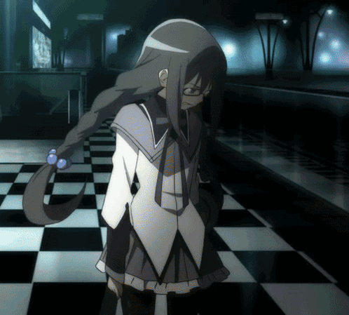 A Girl With Long Hair And Glasses Is Standing On A Checkerboard Floor GIF