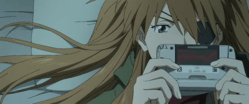 Girl With Long Hair Holding Nintendo Device GIF