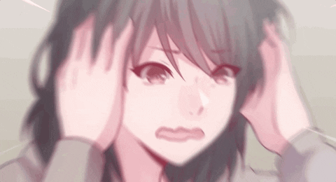 A Girl With Long Hair Is Holding Her Head With Her Hands . GIF