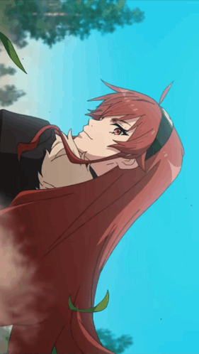 a girl with long red hair is looking up into the sky