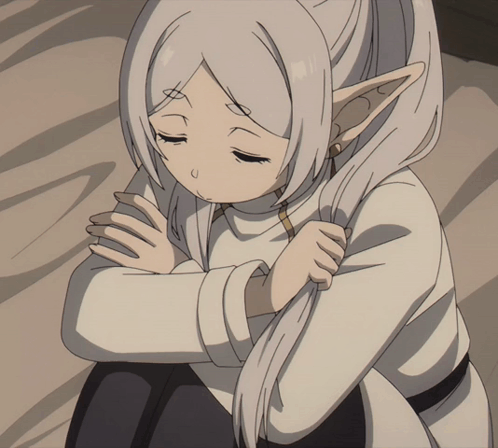 A Girl With Long White Hair And Elf Ears Is Sitting Down With Her Eyes Closed GIF