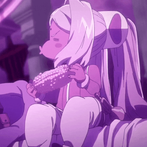 A Girl With Long White Hair Is Sitting On A Chair Eating Popcorn GIF