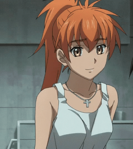 A Girl With Orange Hair And A Cross Necklace GIF