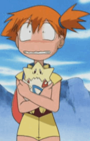 A Girl With Orange Hair Is Holding A Stuffed Animal With A Star On It GIF