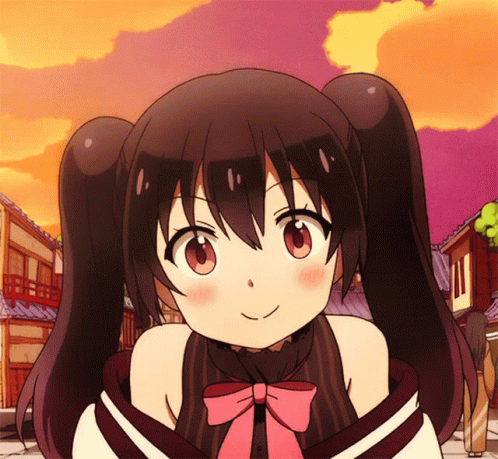 A Girl With Pigtails And A Pink Bow On Her Neck Smiles GIF