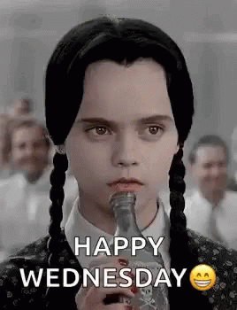 A Girl With Pigtails Is Drinking From A Bottle And Says Happy Wednesday . GIF