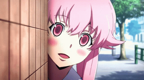 A Girl With Pink Hair And Big Eyes Is Peeking Out From Behind A Wall GIF