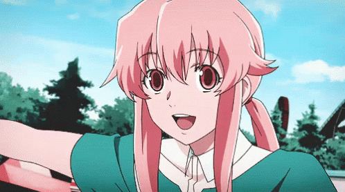 A Girl With Pink Hair And Big Red Eyes Is Smiling GIF