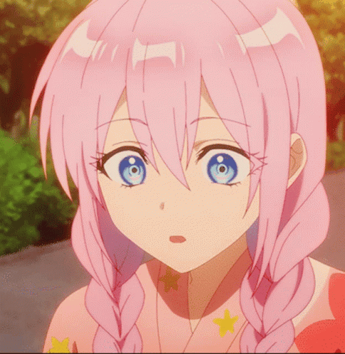 A Girl With Pink Hair And Blue Eyes GIF