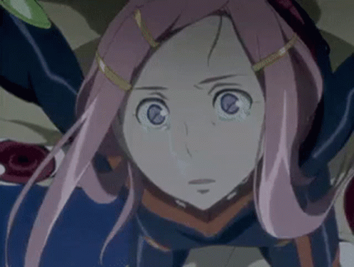 A Girl With Pink Hair And Blue Eyes Is Laying On The Ground GIF