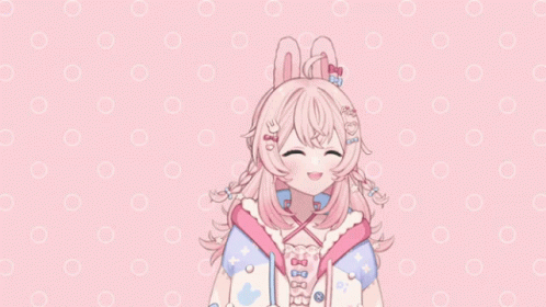 A Girl With Pink Hair And Bunny Ears Is Smiling GIF
