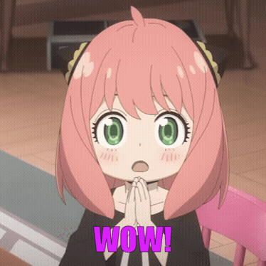 A Girl With Pink Hair And Green Eyes Has The Word Wow On Her Chest GIF