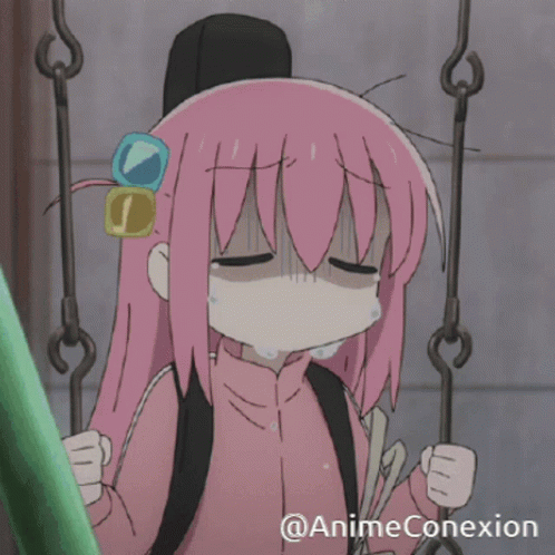 A Girl With Pink Hair Is Crying While Sitting On A Swing With @Animeconexion In The Corner GIF