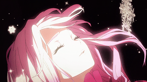 A Girl With Pink Hair Is Laying Down With A Snowflake Hanging From Her Hair GIF