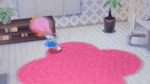 A Girl With Pink Hair Is Laying On A Pink Rug In A Room GIF