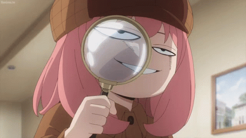 A Girl With Pink Hair Is Looking Through A Magnifying Glass And Smiling GIF