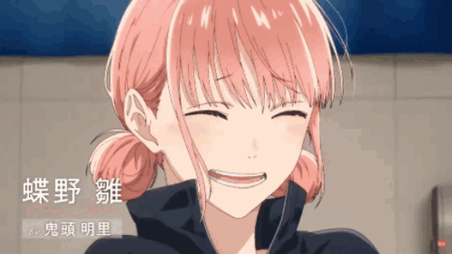 A Girl With Pink Hair Is Smiling With Chinese Writing On The Bottom GIF