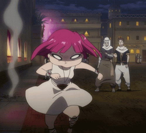 A Girl With Pink Hair Is Standing In Front Of A Building GIF