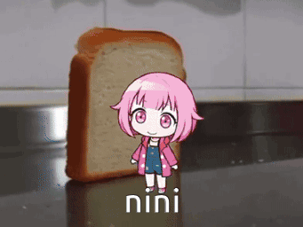 A Girl With Pink Hair Is Standing Next To A Loaf Of Bread With The Word Nini On It GIF