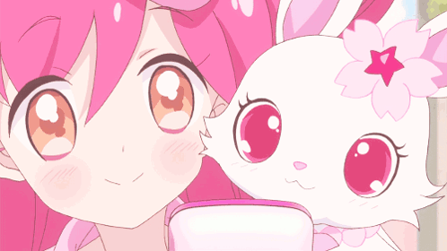 A Girl With Pink Hair Is Standing Next To A White Rabbit With A Flower On Its Head GIF