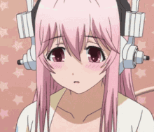 A Girl With Pink Hair Is Wearing Headphones And A White Shirt GIF