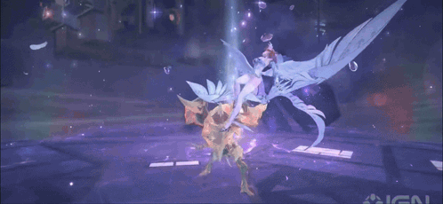 A Girl With Pink Hair Is Wrapped In A Blanket With The Ign Logo In The Background GIF