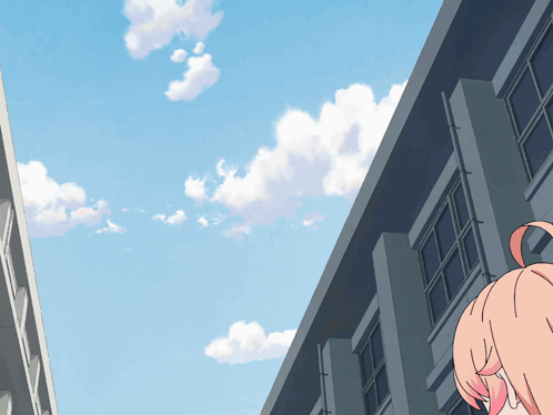 A Girl With Pink Hair Stands In Front Of A Building GIF