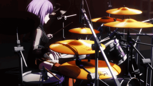 A Girl With Purple Hair Is Playing Drums With A Paiste Drum Set GIF