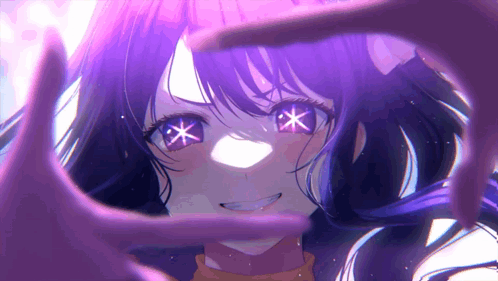 A Girl With Purple Hair Is Smiling And Making A Heart Shape With Her Hands GIF