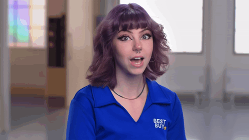 A Girl With Purple Hair Is Wearing A Blue Shirt That Says Best Buy GIF