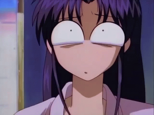 A Girl With Purple Hair Making A Funny Face GIF