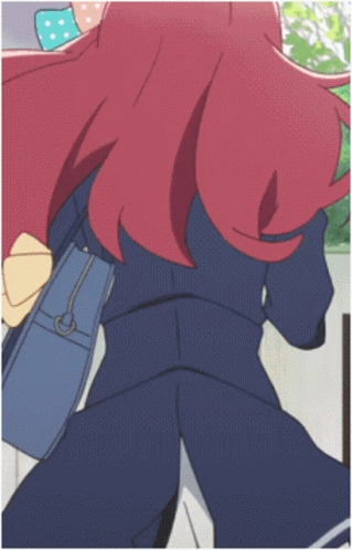 A Girl With Red Hair And A Blue Purse GIF