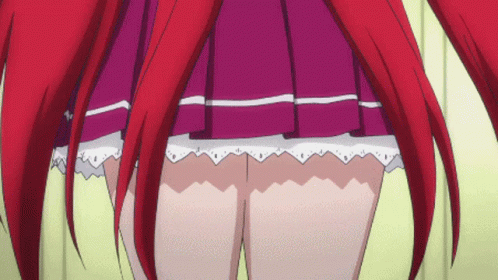 A Girl With Red Hair And A Purple Skirt Has A White Lace Trim GIF