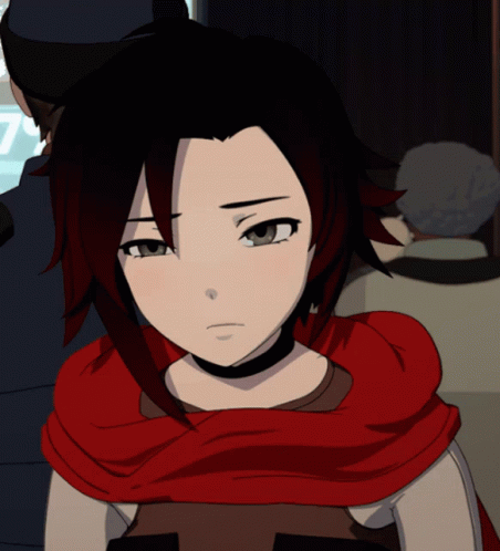 A Girl With Red Hair And A Scarf Around Her Neck Is Looking At The Camera GIF