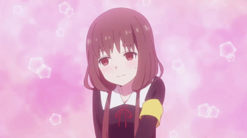 A Girl With Red Hair And A Yellow Arm Band Is Surrounded By Pink Bubbles GIF