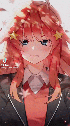A Girl With Red Hair And Blue Eyes Has A Star On Her Hair GIF