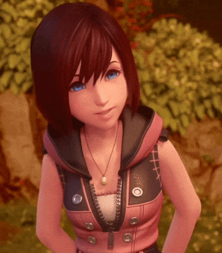 A Girl With Red Hair And Blue Eyes Is Wearing A Pink Jacket With A Hood And A Necklace . GIF