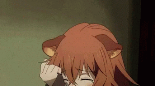 A Girl With Red Hair And Cat Ears Is Holding Her Hair . GIF
