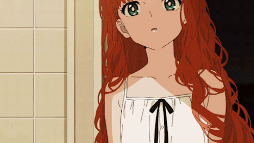 A Girl With Red Hair And Green Eyes Is Wearing A White Dress With A Black Bow GIF