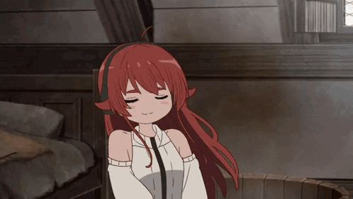 a girl with red hair and headphones on her head