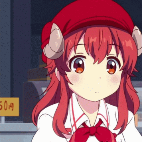 A Girl With Red Hair And Horns Is Standing In Front Of A Sign That Says 5.99 GIF