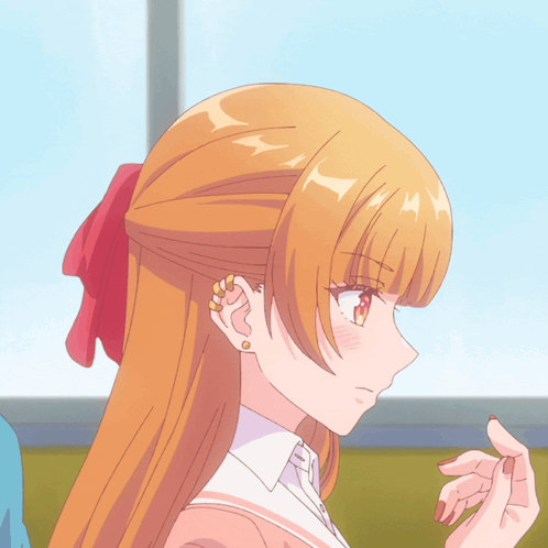 A Girl With Red Hair Has A Red Bow In Her Hair GIF