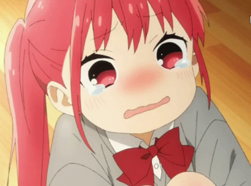 A Girl With Red Hair Is Crying With Tears On Her Face GIF