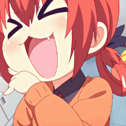 A Girl With Red Hair Is Making A Funny Face With Her Mouth Open GIF