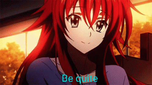 A Girl With Red Hair Is Smiling With The Words Be Quite Behind Her GIF