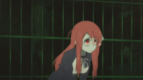 A Girl With Red Hair Is Standing In Front Of A Green Fence GIF