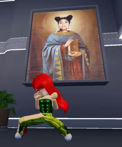 A Girl With Red Hair Is Standing In Front Of A Painting Of A Woman Holding A Book With A Cross On It GIF